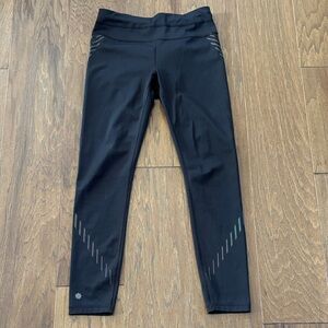 Athleta Black Athletic Leggings with reflective pattern. Size XS.